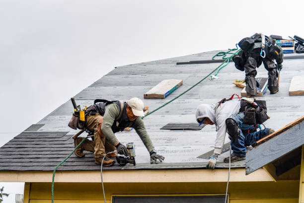 Professional Gutter Installation technician working in Caldwell, KS